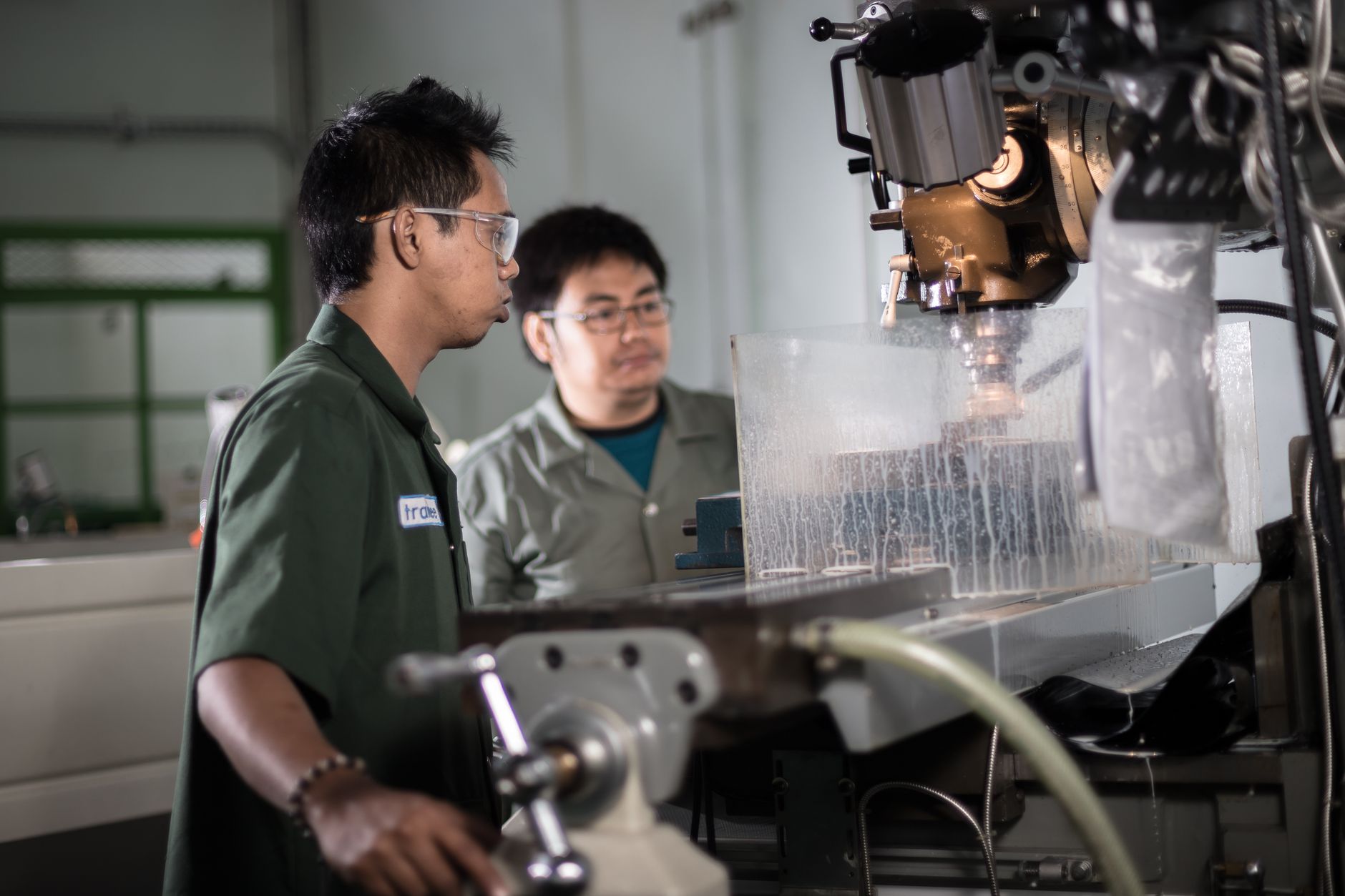 Manufacturing team analyzing schematics